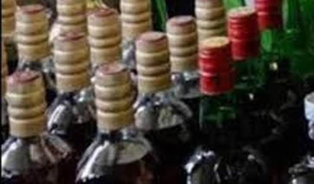 Accused arrested for illegal liquor sale 33 bottles of illicit liquor seized